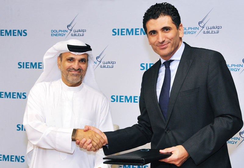 Adel Ahmed Albuainain, CEO of Dolphin Energy, and Fatih Sakiz, CEO Siemens Qatar. Adel Ahmed Albuainain, CEO of Dolphin Energy, and Fatih Sakiz, CEO Siemens Qatar.