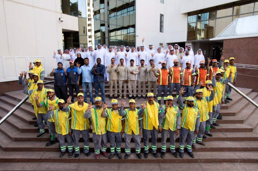 Dawood Al Hajiri, Director General of Dubai Municipality poses for photo with the workers on the International Worker’s Day. Dawood Al Hajiri, Director General of Dubai Municipality poses for photo with the workers on the International Worker’s Day.