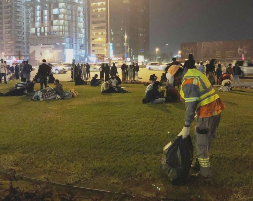 A Dubai Municipality staff cleans waste at New Year celebration site. A Dubai Municipality staff cleans waste at New Year celebration site.